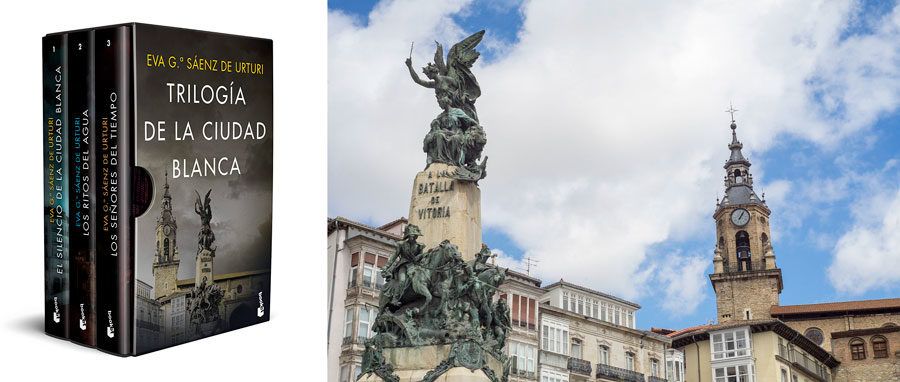 Libro de la Trilogía de la ciudad blanca y Plaza de la Virgen Blanca en Vitoria.